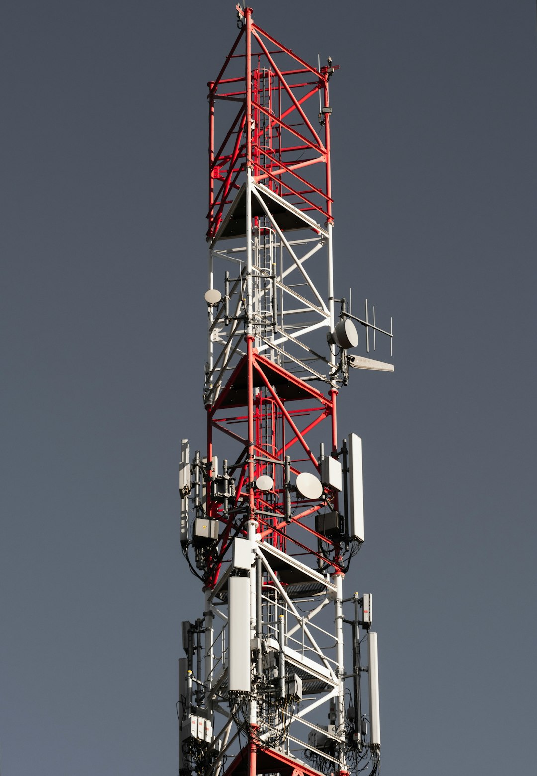 services-03 a-tall-tower-with-a-lot-of-lights-on-top-of-it-df6pwkujwcw